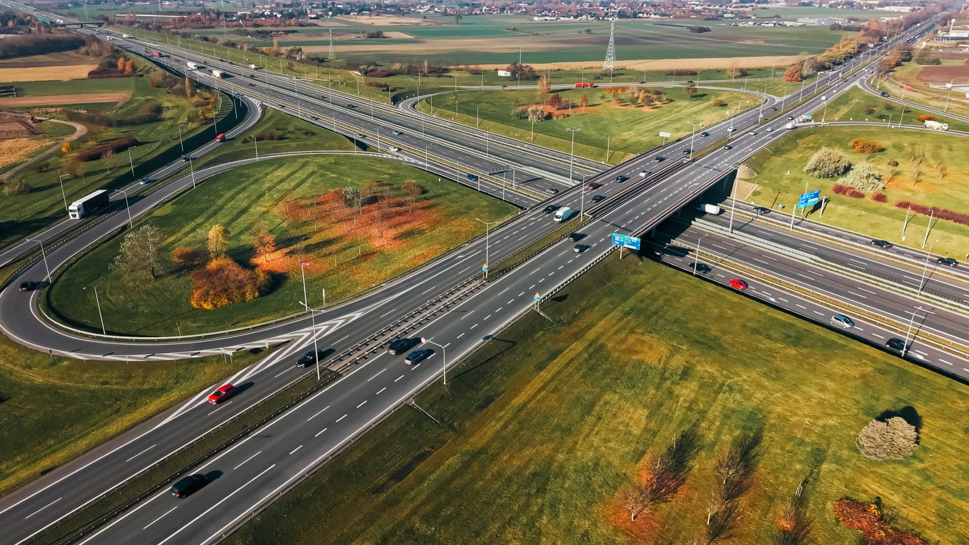 Aerial view of a major highway interchange with traffic